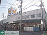 周辺：グルメシティ稲城店 982m