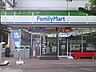 周辺：ファミリーマート 枚方岡東町店（718m）