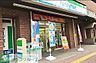 周辺：ファミリーマート伝通院前店 徒歩1分。 60m