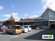 スーパー「マルナカ徳島空港店まで1018m」