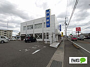 銀行「四国銀行藍住支店まで376m」