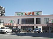 ライフ　梅津店まで930メートル