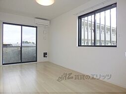 ラクーン守山 3階1LDKのリビング/ダイニング