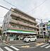 周辺：【コンビニエンスストア】ファミリーマート　尼崎大庄西町店まで373ｍ