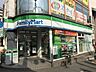 周辺：ファミリーマート 京屋河内花園駅前店（303m）