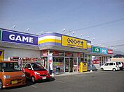 レンタルビデオ「ゲオ稲里店まで1099m」