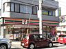 周辺：セブンイレブン高尾駅南口店 690m