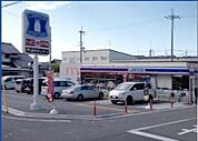 ローソン摂津一津屋一丁目店 81m