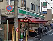 ローソンストア100摂津富田店 13m