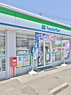 コンビニ「ファミリーマート久居庄田店まで716ｍ」