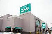 ホームセンター「ニトリ四日市店まで1613ｍ」
