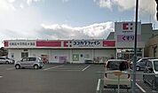 ドラックストア「ココカラファイン浜田店まで874ｍ」