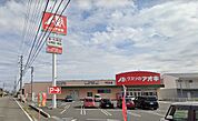 ドラックストア「クスリのアオキ下さざらい店まで881ｍ」