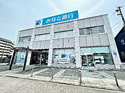 銀行「みなと銀行夢野支店まで912m」