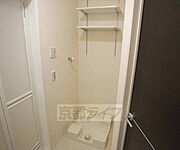 洗濯機はここに。