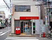 豊島千川駅前郵便局 151m