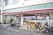 ローソンストア100草加松原四丁目店 370m