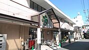 スーパー「ライフ塚本店まで104m」