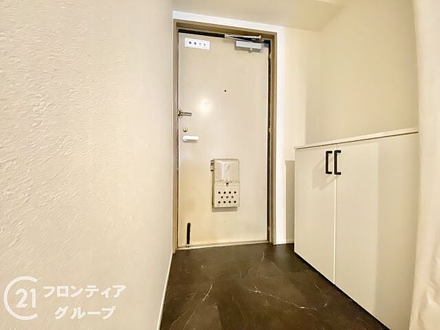 玄関 ローレルコート学園前Ｃ棟　中古マンション 1階/-