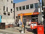 郵便局「守口土居郵便局まで462m」