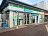周辺：ファミリーマート 近鉄東生駒駅前店（340m）