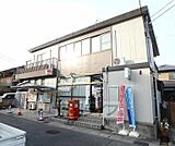 木津南垣外郵便局まで497m