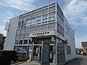 郵便局「松本筑摩東郵便局まで497m」
