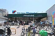 万代布施店 309m