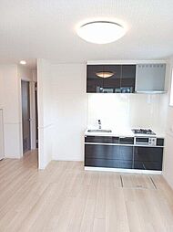 メゾン12朝来 107 1階1LDKのリビング/ダイニング