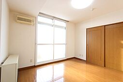 フェイマスKITAMI　1番館 403 4階3LDKのリビング/ダイニング