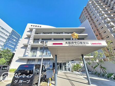 大阪府守口警察署 徒歩8分。隣接する市庁舎と一体に見えるようなデザインで、警察の象徴性を出すために建物頂部は特徴ある形状になっております。住宅街にございますので安心して住んでいただけます。 600m