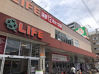 周辺：【スーパー】ライフ 大国町店まで711ｍ