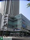 camio 徒歩11分。ショッピングセンター 870m