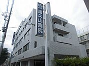 病院「医療法人社団医仁会譜久山病院まで680m」
