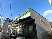 ファミリーマートJR千里丘駅西口店(コンビニ)まで113m