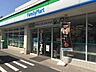 周辺：【コンビニエンスストア】ファミリーマート 246世田谷桜新町店まで1009ｍ