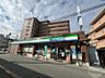 周辺：ファミリーマート東大阪稲田上町店 374m