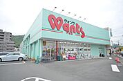 ドラックストア「ウォンツ戸坂店まで718ｍ」