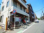 足立大川町郵便局（566m）