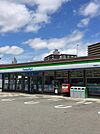 ファミリーマート名神吹田インター前店 597m