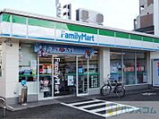 ファミリーマート千里丘北口店 509m