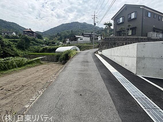 現地（2025...