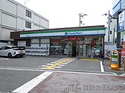 ファミリーマート江坂町二丁目店 徒歩12分。 920m