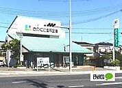 銀行「きのくに信用金庫六十谷支店まで1230m」