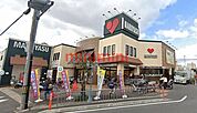 スーパーマルヤス登美の里店 869m