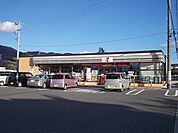 コンビニ「セブンイレブン　塩尻大小屋店まで890m」