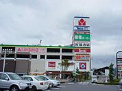 複合モール「サンキ松本店まで938m」