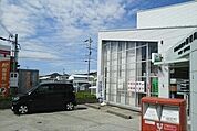 郵便局「和歌山楠見中郵便局まで477m」