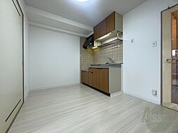 札幌市営東西線 西11丁目駅 徒歩10分の賃貸マンション 4階1DKのリビング/ダイニング