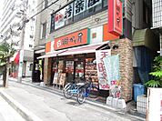街かど屋江坂店 徒歩7分。 520m